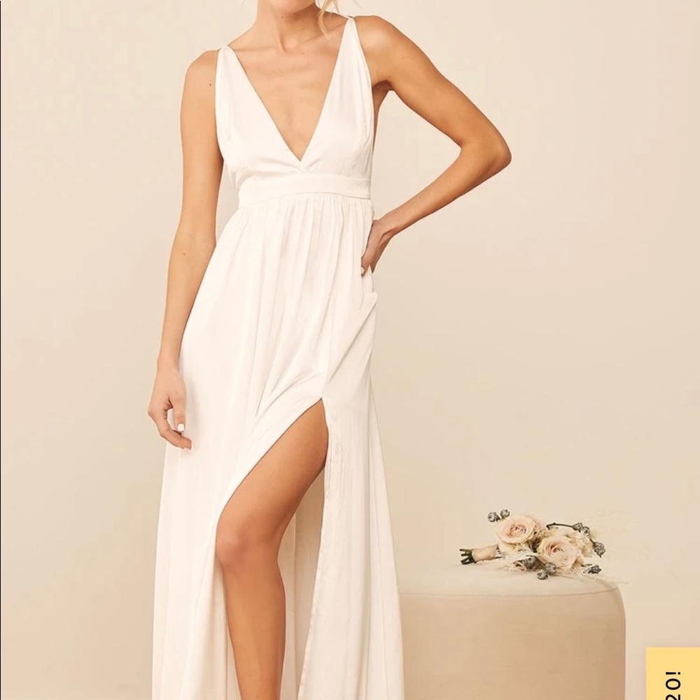 A white satin wedding dress from Lulu’s. NWT